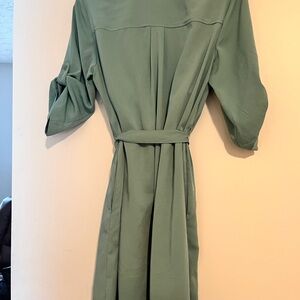 A very, very soft light turquoise color shirt, dress